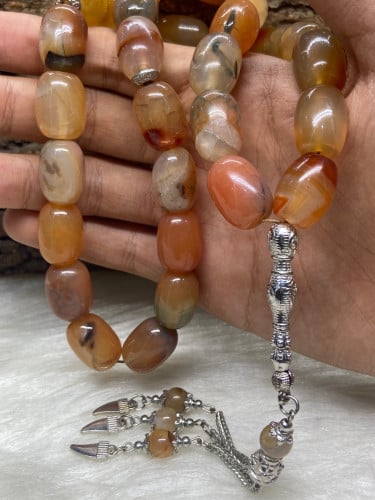 حجر عقيق برازيلي مشمشي حبه راهيه عدد33