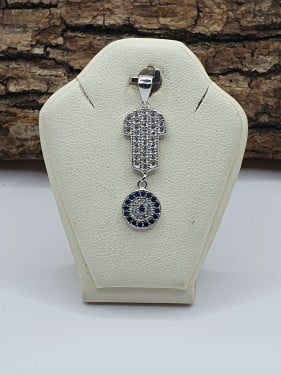 تعليقه علي شكل كف مع دائره وسط