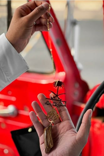 تعليقة سيفين ونخلة و كسرة العود على طلبك