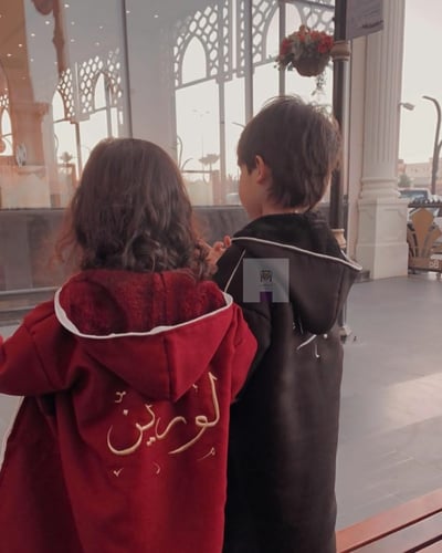 فروة شتوية للاطفال عنابي واسود