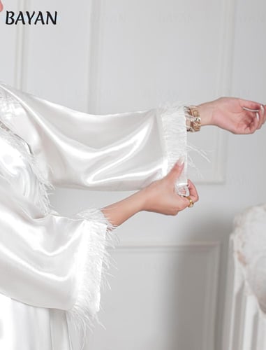 روب الريش كم وأمام