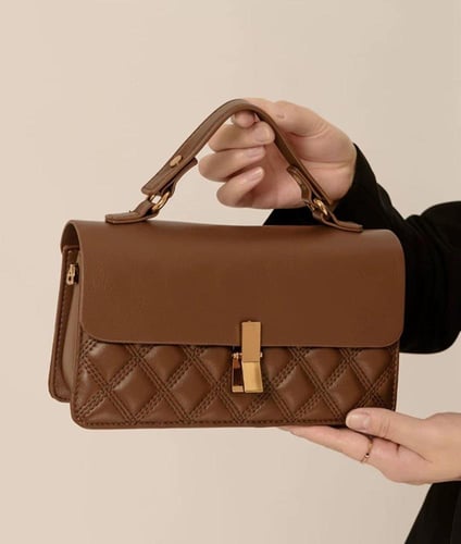 حقيبة يد ( كريمي )