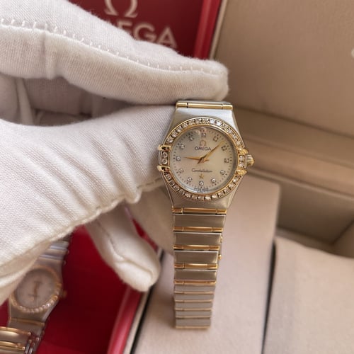 ساعة اوميغا نسائي ستيل وذهب و الماس
