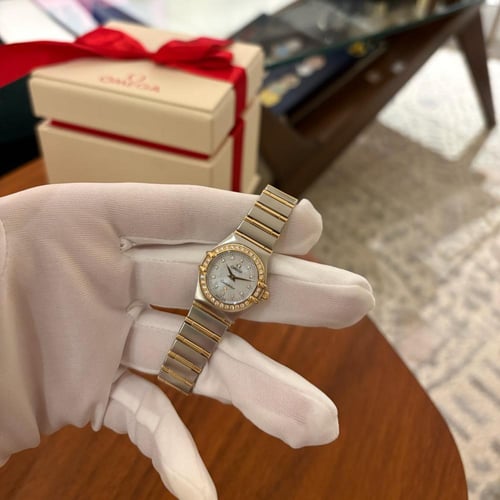 اوميغا نسائي ستيل وذهب فل بار