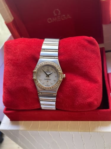 ساعة اوميغا نسائي ستيل وذهب و الماس