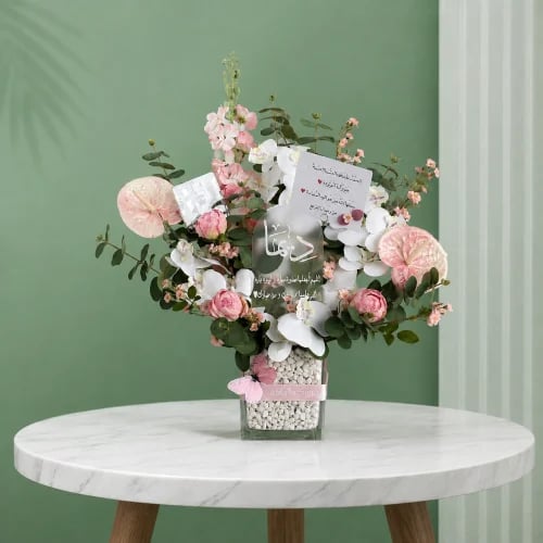 A gift that can be customized according to your wish, a vase of artificial flowers with a stand for writing the name or the occasi...