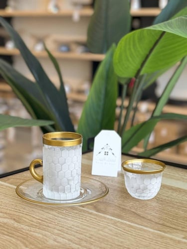 طقم شاهي وقهوة 18 قطعة وبتفاصيل ثلجية وذهبية