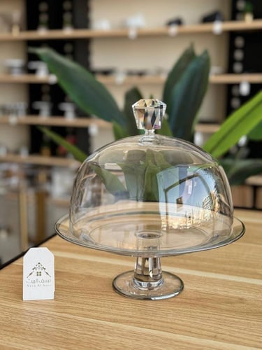 آنية تقديم زجاجية بغطاء وبتفاصيل فضية