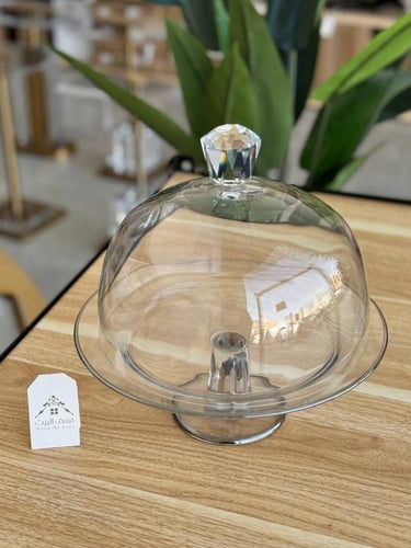 آنية تقديم زجاجية بغطاء وبتفاصيل فضية