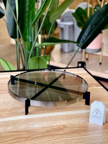 حامل زجاجي رمادي وبقاعدة سوداء