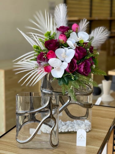 فازة زجاج شفاف مع فضي