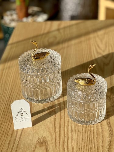 وعاء تقديم زجاجي مع مسكة اوزة ذهبية