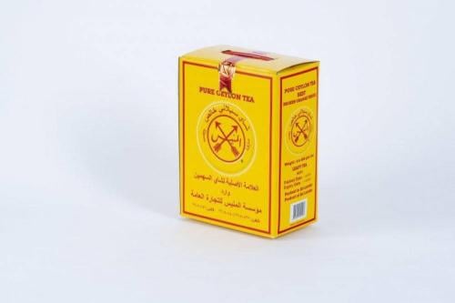 شاي المنيس اسود علبة كرتون اصفر - خشن _ 450 جرام