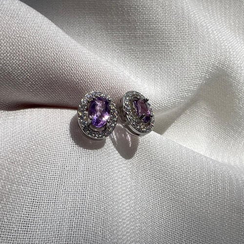 اقراط امثيست