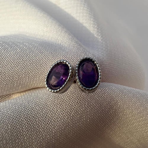 اقراط امثيست