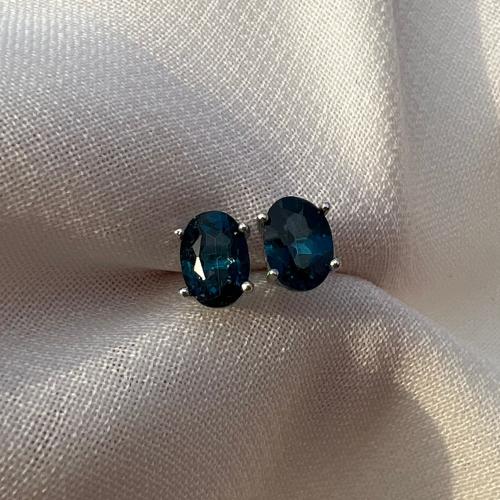 اقراط لندن توباز