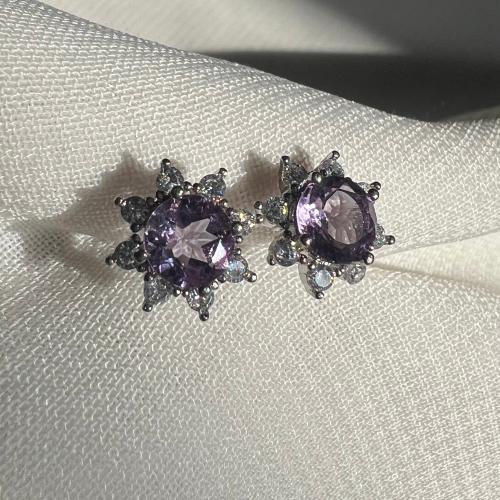 اقراط امثيست