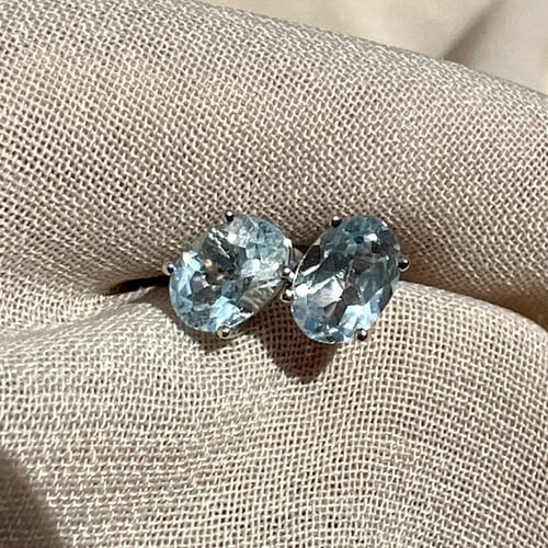 اقراط توباز