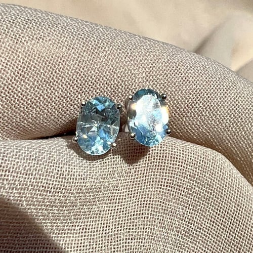 اقراط توباز