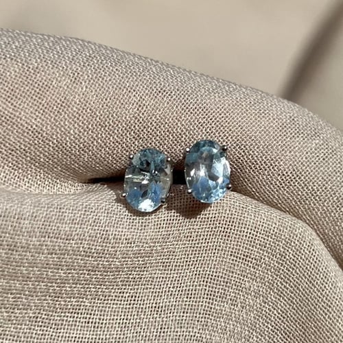 اقراط توباز