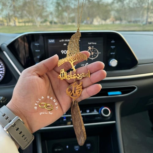 تعليقة سيارة عود مع رسمة الصقر