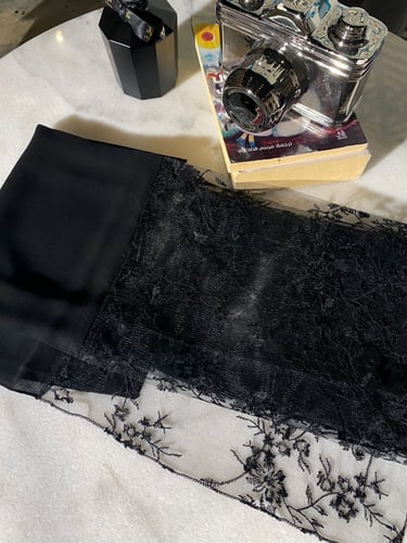 طرحة تُل اسود