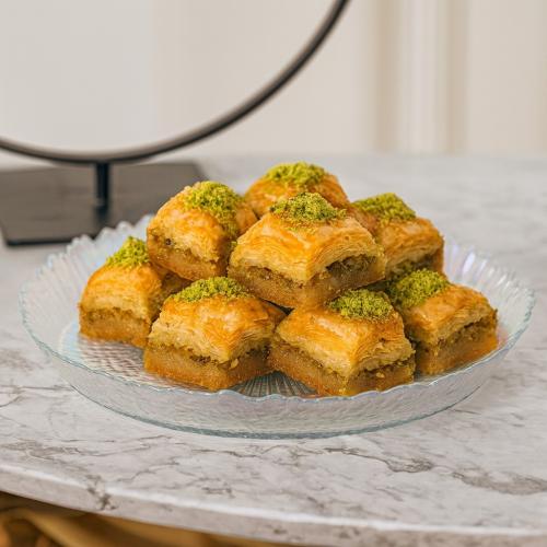 صحن تقديم حلويات زجاج تركي مدور مقاس 32 سم