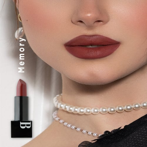 نوره بوعوض احمر شفاة كريمي مخملي ومطفي ناعم على ال...