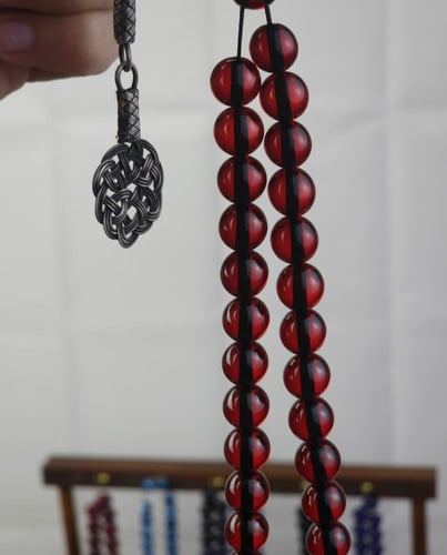 سبحة بكلايت احمر شفاف حرباء طربزونة فضة