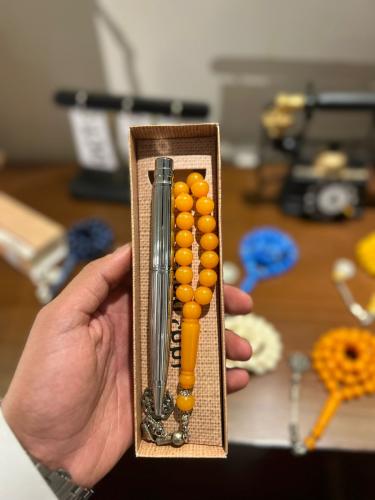 طقم قلم سانتوس فضي والسبحة الكركمية