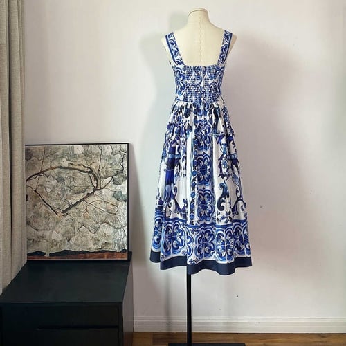 W8فستان كريب منقوش بالازرق