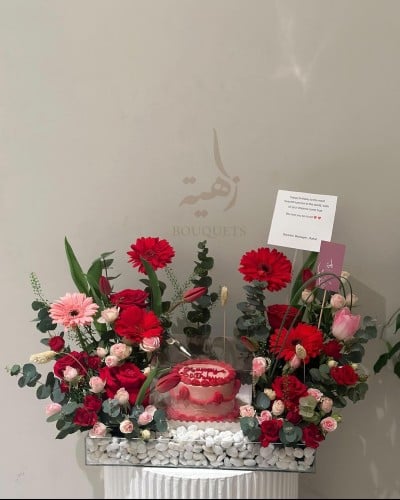 Stand of roses and cake