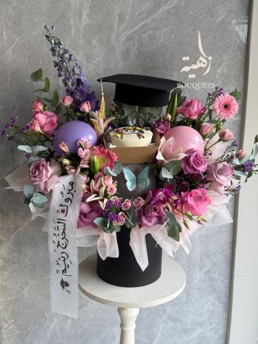 Graduation box with cake and ribbon