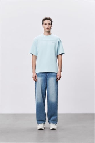 تيشيرت إنترلوك أزرق سماوي للجنسين