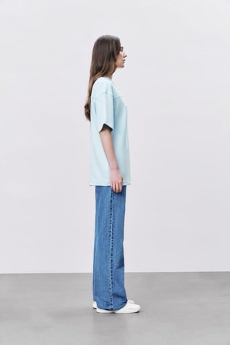 تيشيرت إنترلوك أزرق سماوي للجنسين