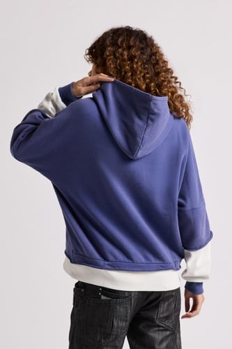 هودي بقصة واسعة Acid Wash وأكمام من لون مختلف للجن...