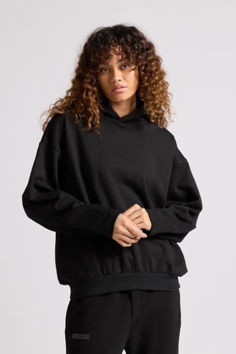 هودي بطباعة وقصة واسعة Acid Wash للجنسين أسود