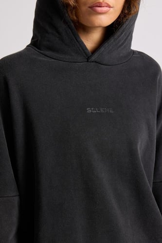 هودي بقصة واسعة Acid Wash وأكمام من لون مختلف للجن...