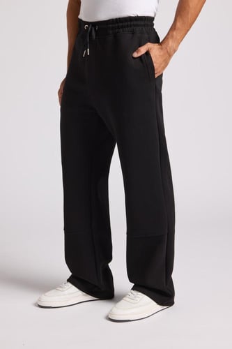 بنطلون جيرسيه مرن أوفرسايز للجنسين - أسود