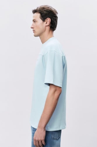 تيشيرت إنترلوك أزرق سماوي للجنسين