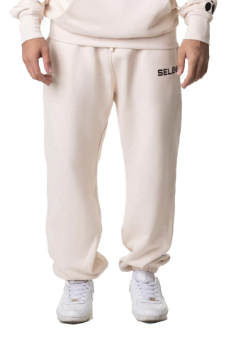 بنطلون سيلين بقصة ضيقة من الأسفل كريمي