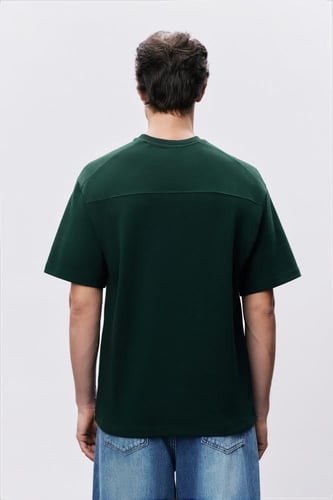 تيشيرت إنترلوك أخضر غامق للجنسين