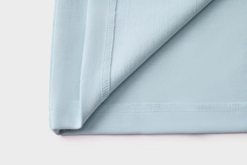 تيشيرت إنترلوك أزرق سماوي للجنسين