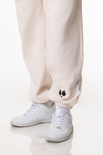 بنطلون سيلين بقصة ضيقة من الأسفل كريمي