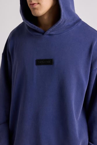 هودي بقصة واسعة Acid Wash للجنسين أزرق غامق