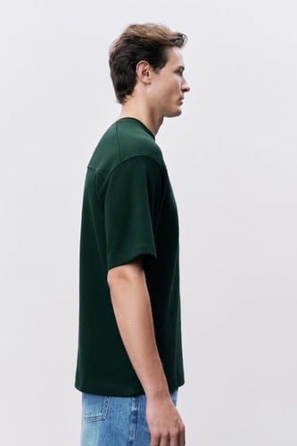 تيشيرت إنترلوك أخضر غامق للجنسين