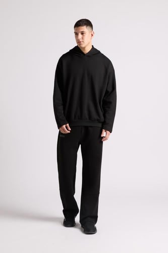 هودي بطباعة وقصة واسعة Acid Wash للجنسين أسود