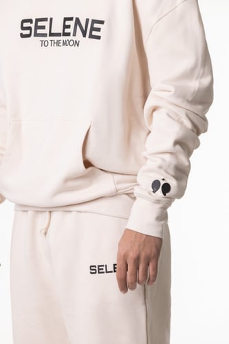 بنطلون سيلين بقصة ضيقة من الأسفل كريمي