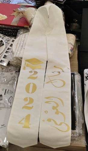 الطباعة على وشاح التخرج