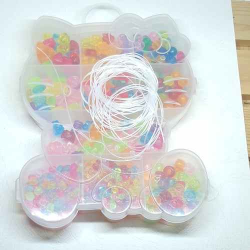 صندوق خرز - ابيض شفاف يحتوى على العديد من الخرز مخ...